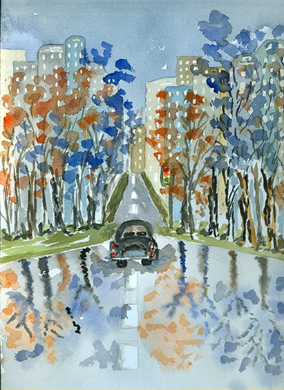 Automóvil por una avenida con árboles.