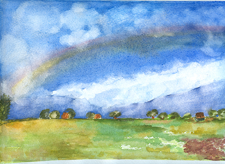 Campo con arco iris.